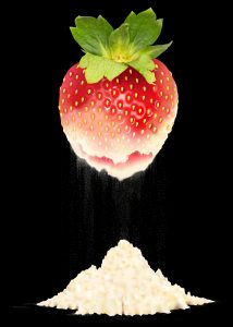 Food dissolving into powder to illustrate the concept of all-natural flavors.