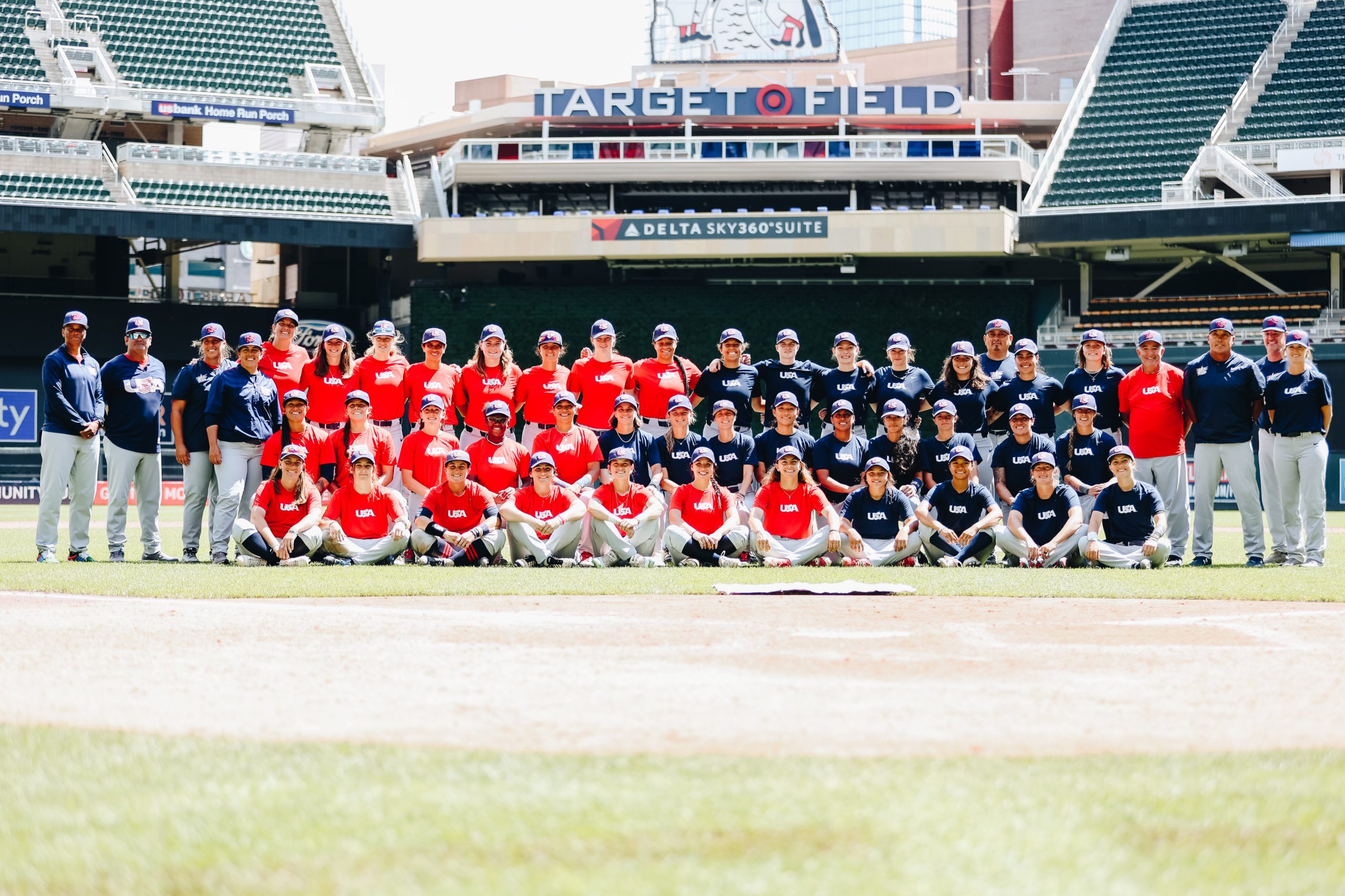 A team photo of the USA women's baseball team.